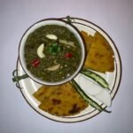 Saag- Makki Di Roti, Raddish salad, Lassi and Ghee Shakkar